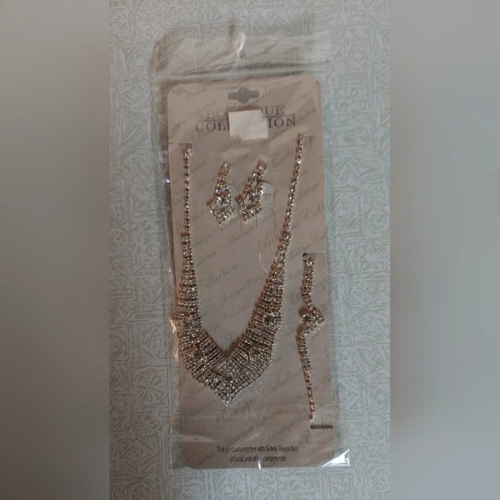 Faux diamond necklace, earrings, and bracelet